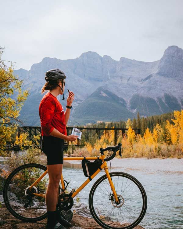 Riding In Canmore with Fall Colours Along the River